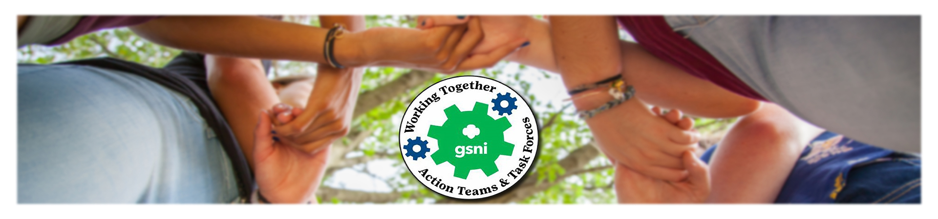  Action team logo with girls holding hands 