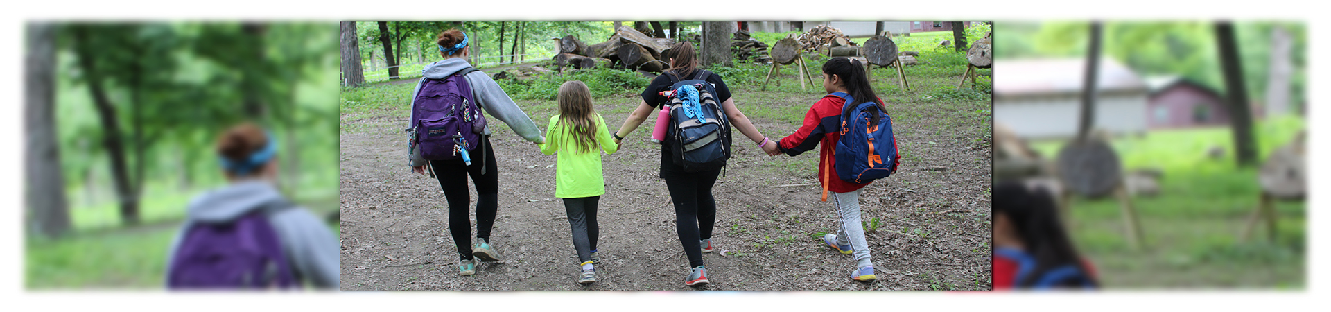  troop leader hold hands with girl scouts 